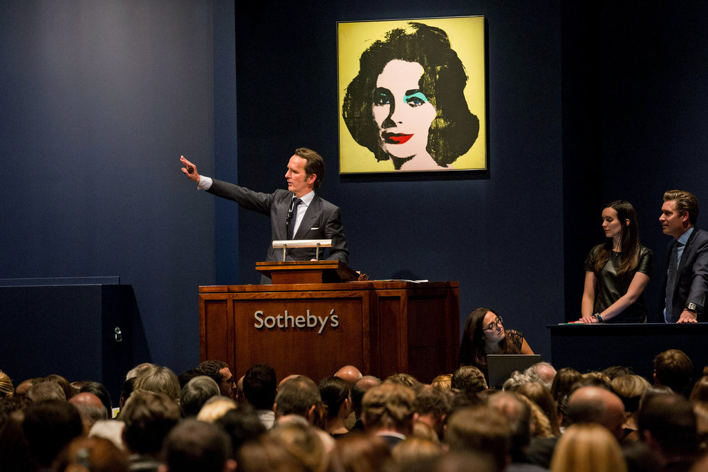 9 An Andy Warhol at Sotheby_s last fall. By teaming up with eBay, it hopes to reach buyers who might never come to a sale room.